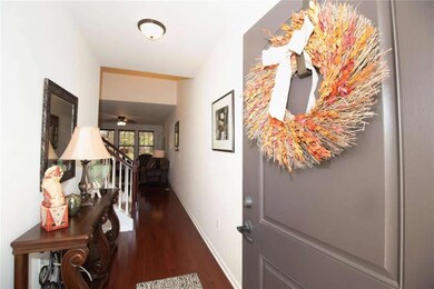 Beautiful wood flooring welcomes you as you enter 