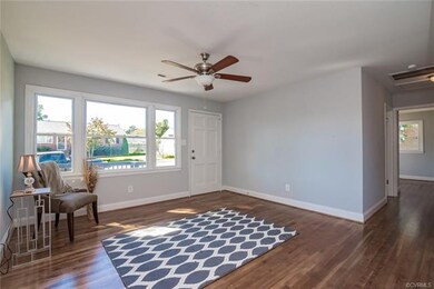 Another view of living room. Hallway offers two coat closets- great storage.