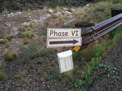 Top of hill directional sign