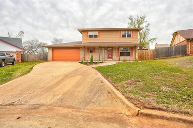 View of front facade featuring a front lawn and a 