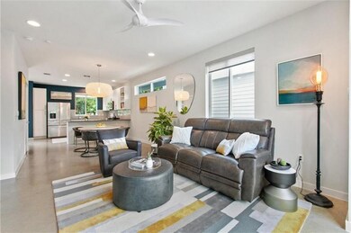 Living room featuring recessed lighting, a ceilin