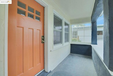 Doorway to property with covered porch