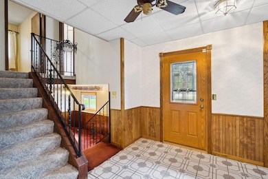 Enter into the large foyer.