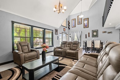 Enjoy a spacious living area with high ceilings an