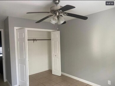 Unfurnished bedroom featuring tile patterned floo
