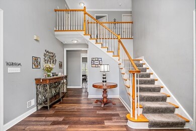 The updated flooring in the entry spans the entire