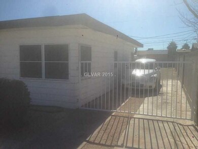 Property Photo. Driveway with RV parking and gate.