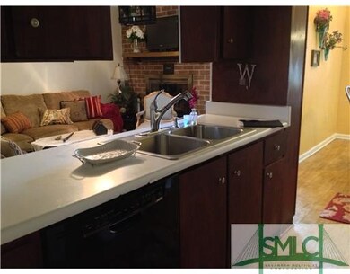 Kitchen. Kitchen open to Living Room