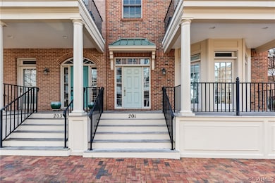 Entrance to property featuring a porch