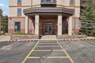 Entrance to property featuring uncovered parking,
