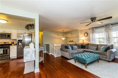 This totally renovated kitchen and living room are