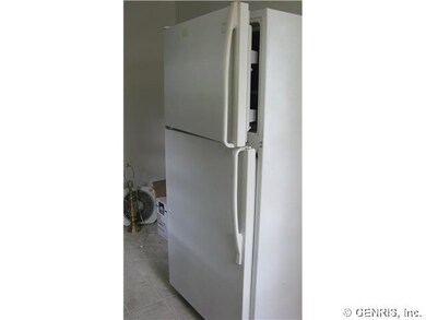 Kitchen. Refrigerator stays with property. Note th