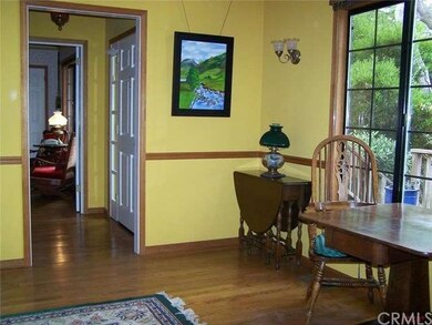 Looking from family room through rear entry into m