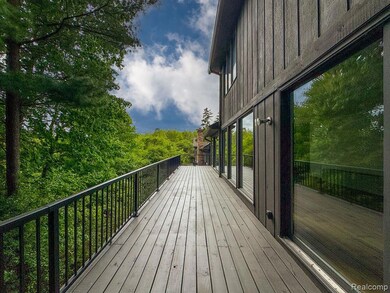 Deck Spanning the Length of First Level Living