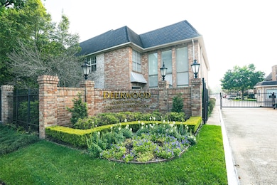 Entrance to Deerwood Condos
Lush landscaping, vibrant flowers, and elegant brickwork welcome you home, while secure entry ensures peace of mind. This inviting entrance sets the tone for a serene and sophisticated lifestyle just minutes from the city’s top destinations.