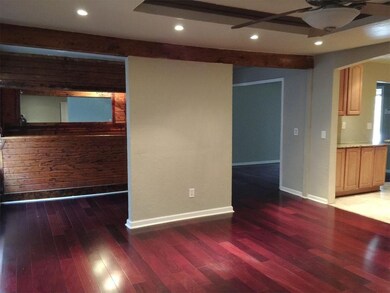 An area with a wet bar, connected to the living ro