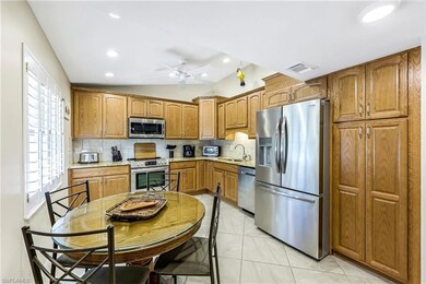 Kitchen featuring plenty of natural light, decorat