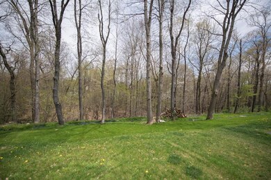 This 2 story home is situated on a .95 acre lot wi
