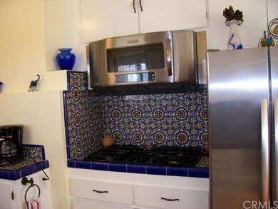 5 burner gas stove and newer stainless microwave 