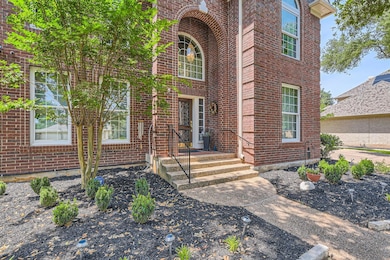 Property entrance with brick siding