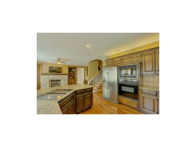Newly refinished 2 tone kitchen cabinets in walnut