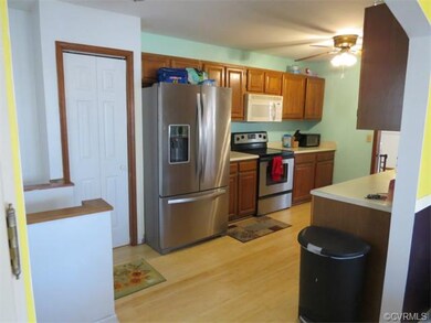 Spacious Kitchen with Bamboo Flooring and Plenty o