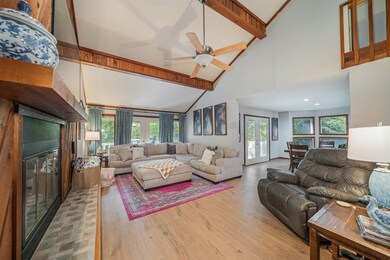 Living room featuring french doors, light hardwood