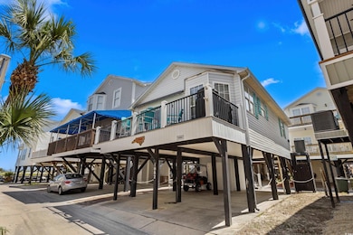 View of property with a carport