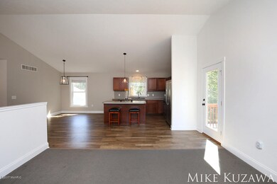 329 N Jefferson St, Lowell, MI 49331 - photo 5