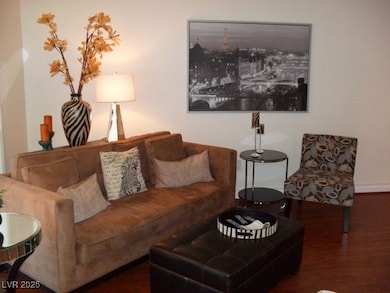 Living room featuring wood finished floors