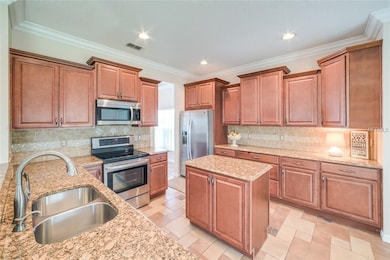 This is a cook's dream! Granite counters, stainles