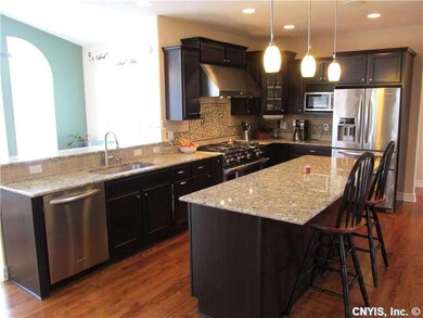 Kitchen Gourmet kitchen with commercial oven range