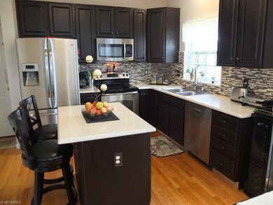 Updated kitchen with stainless steel appliances an