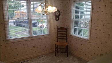 CLOSER VIEW OF EAT-IN- KITCHEN FACING FRONT