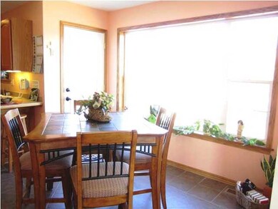 Dining area features gorgeous view and walks out o