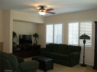 Family Room with Plantation Shutters and an entertainment nook!