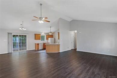 Great room looking into the open dining area and k