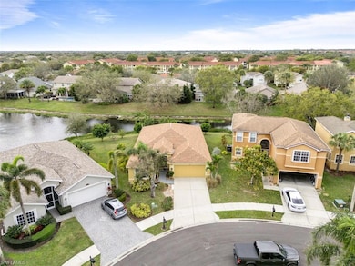 Aerial view featuring a residential view and a wat