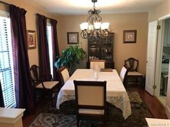 Formal dining room is in the front of the home and