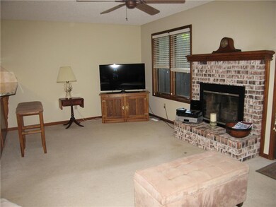Open living area with cozy fireplace