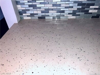 Upgraded countertops and backsplash in the kitchen