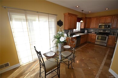Dining area with Travertine tile