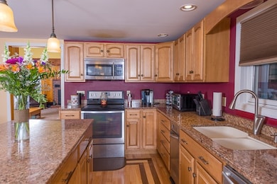 Custom Cabinets and stainless appliances