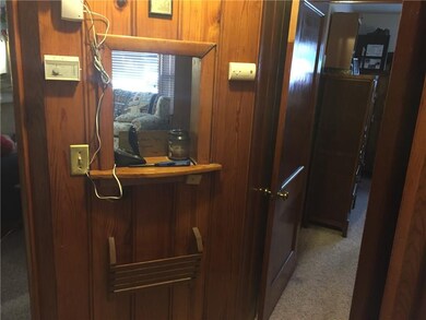 Old time phone station and phone book rack.