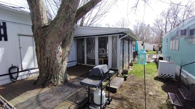 Back Yard with grill and deck.