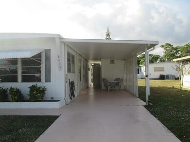 6403 S Elm Ln, Atlantis, FL 33462 - photo 2