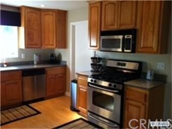 Kitchen with granite counters, stainless appliance