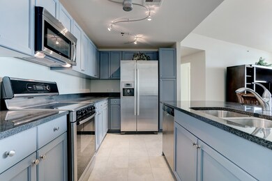 Kitchen features stainless steel appliances and gr