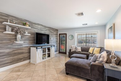 Living Room with Neighborhood Views