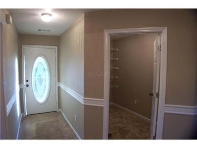 Walk in closet  in the entry way area.